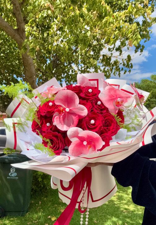 30 Red Roses Mixed Phalaenopsis Orchids Twisted Arranging