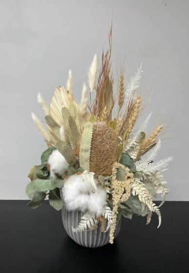 Dried Floral Arrangement in a Ceramic Vase