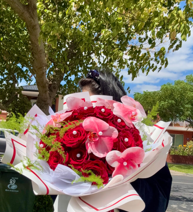 30 Red Roses Mixed Phalaenopsis Orchids Twisted Arranging