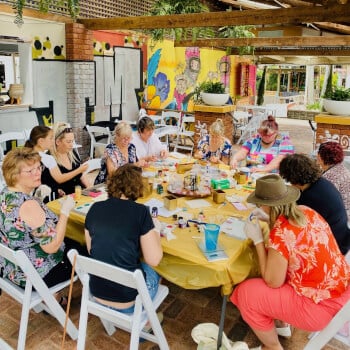 Find a spot at the table and make yourself comfortable!