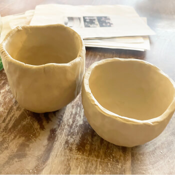 Make two pinch pots