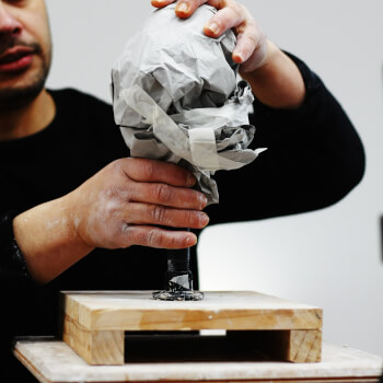 Step 2: Form the base of the head with newspaper.