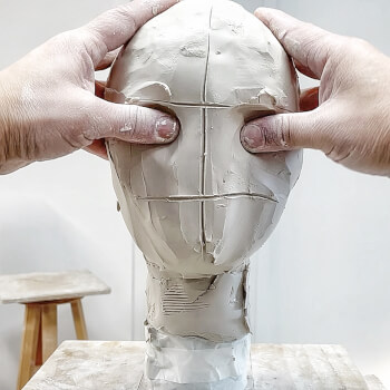 Step 7: Mark the face proportions and make the eye sockets.
