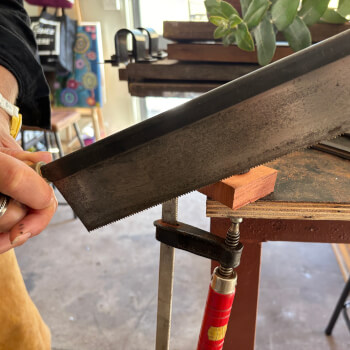 Using different types of hand saws