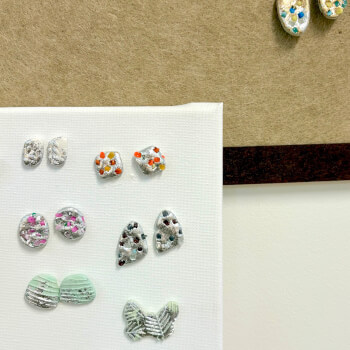 Glue the earrings and assemble the ear hooks.