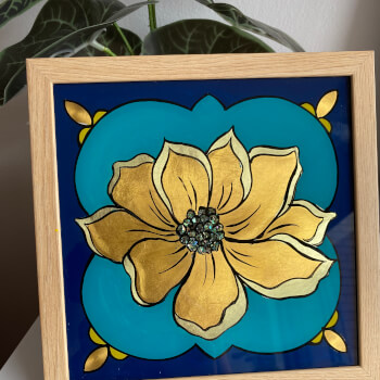 Back up the gold leaf