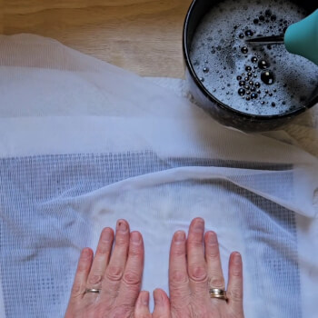 Rub, agitate and shape the wool and silk fibres.