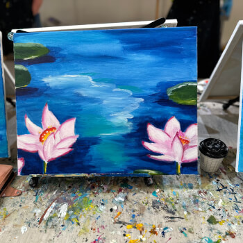Paint lily pads, flowers and water details