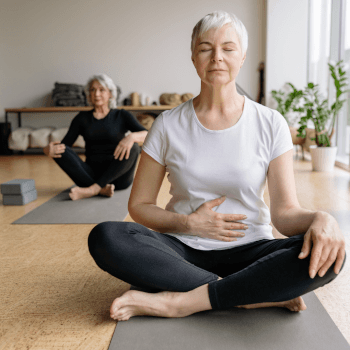 Sitting on a floor or a chair feeling breath