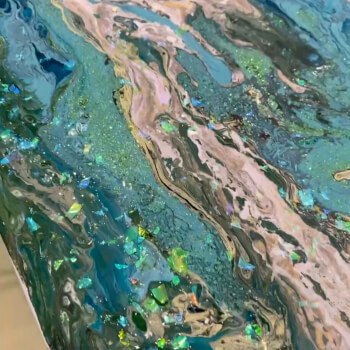 Add glitter, shimmer dust, gold leaf, or use tools