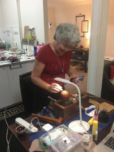 Kristine finishing her first project 