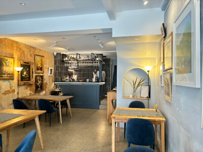 Book Into-Arts Cafe & Gallery