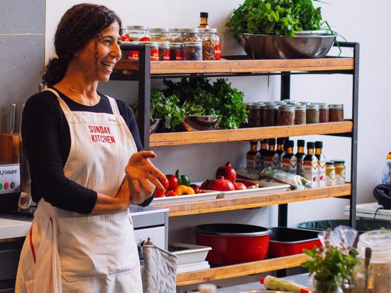 Sivine teaching a cooking class at Sunday Kitchen