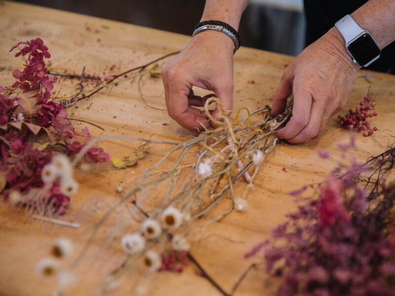 arranging dried flowers