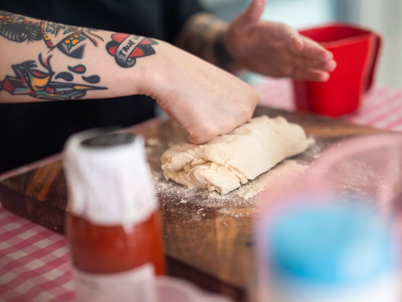 Rolling dough in pasta making class