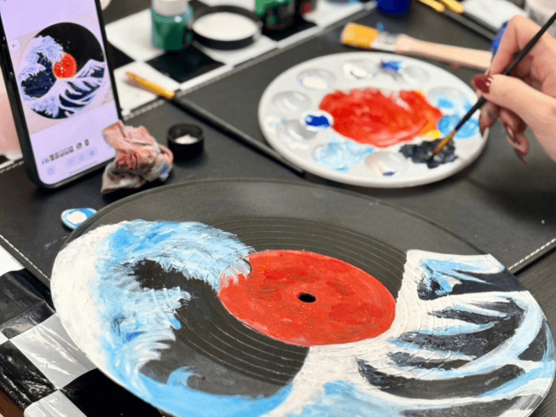 hand painting a vinyl record