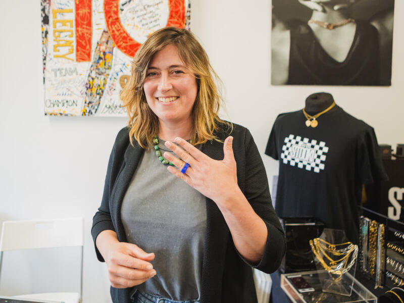 woman posing with wax ring mould
