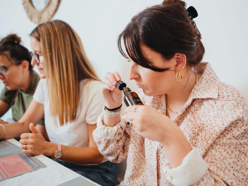 Woman sniffing scents