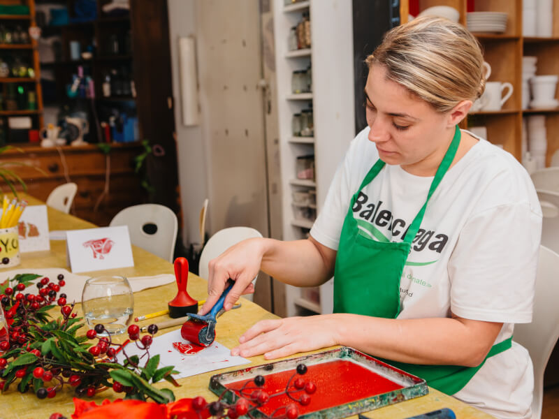 Woman making a Christmas card
