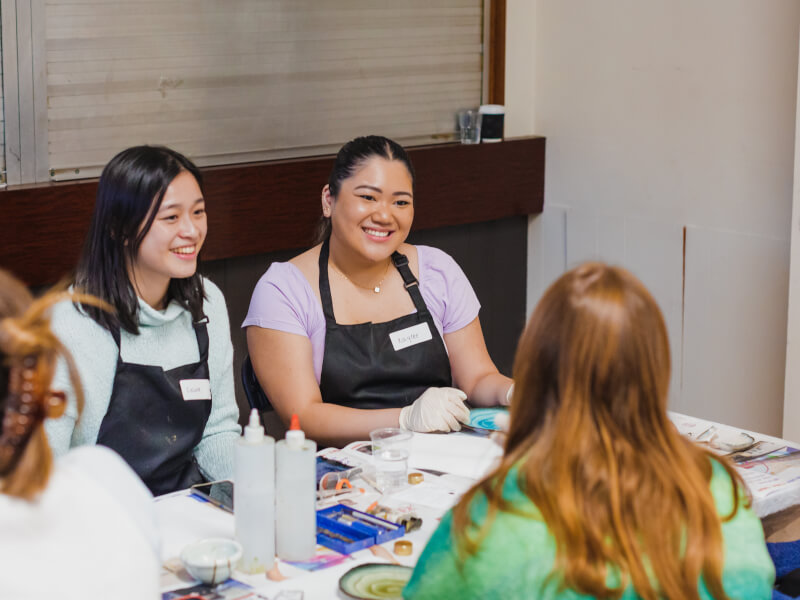Women smiling at a Kintsugi class