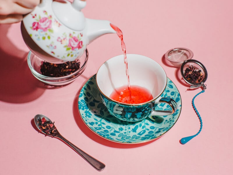 pouring blended herbal tea