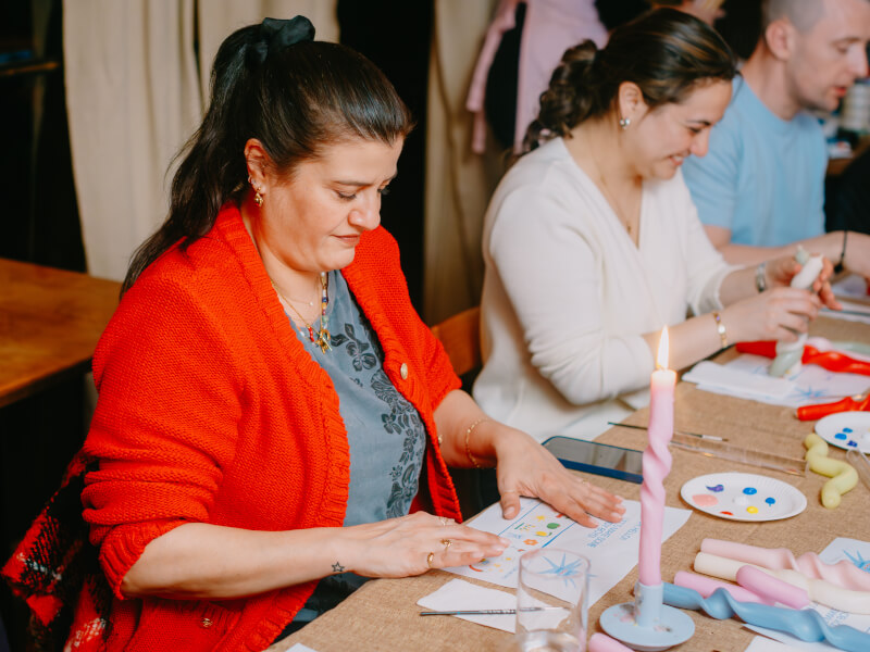 Woman making candles