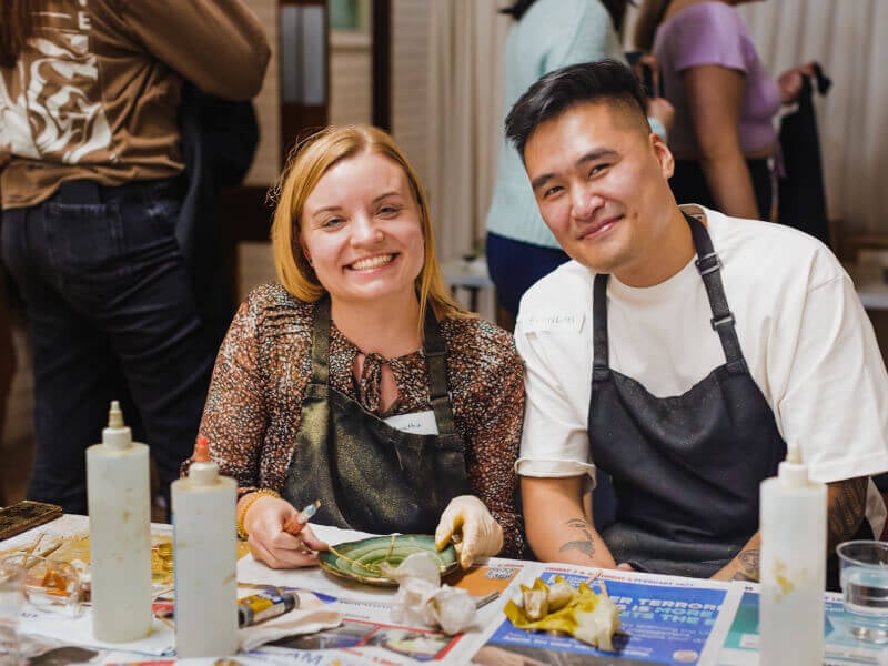 People smiling at a Kintsugi class