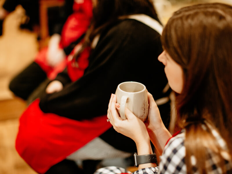 woman holding coffee mug