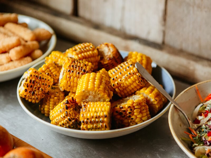 A plate of BBQ corn