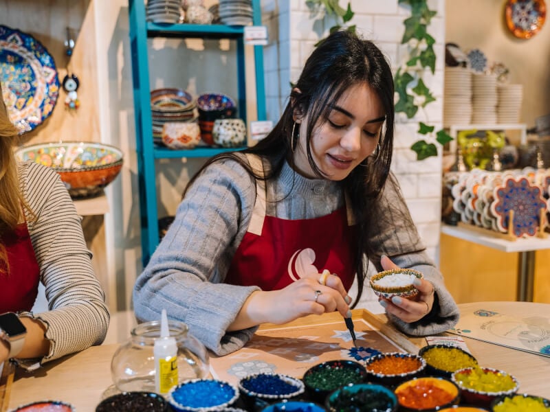 Woman in a mosaic class