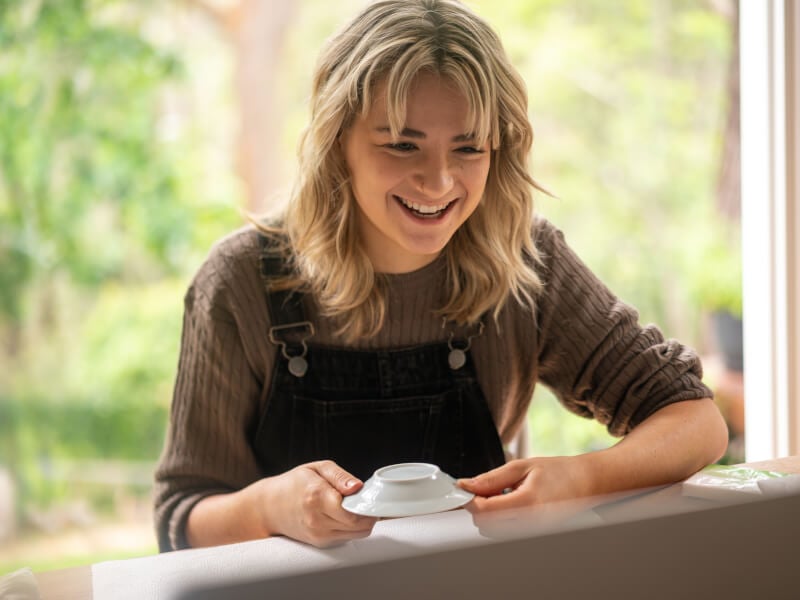 woman smiling at online kintsugi class
