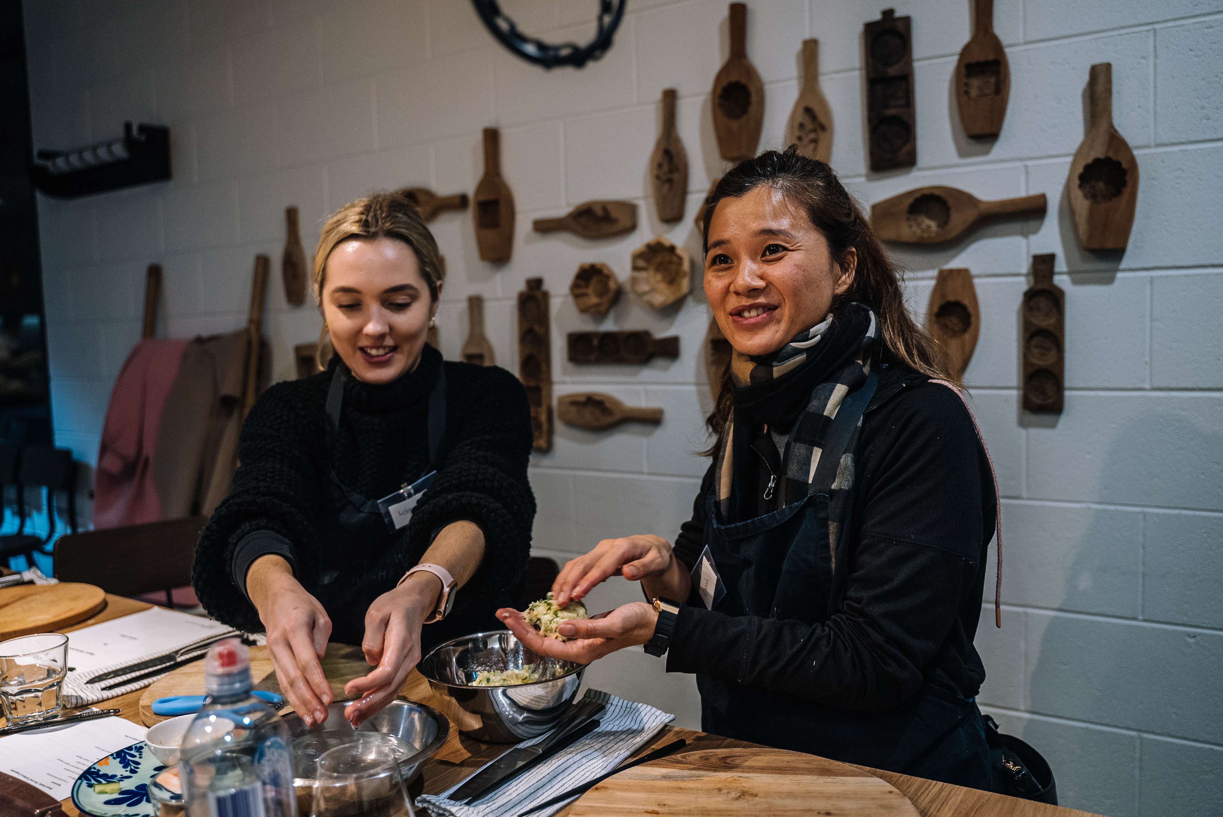Two women cooking Vietnamese food