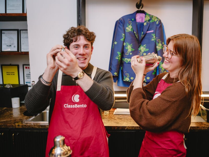 A couple at a cocktail making class for date night