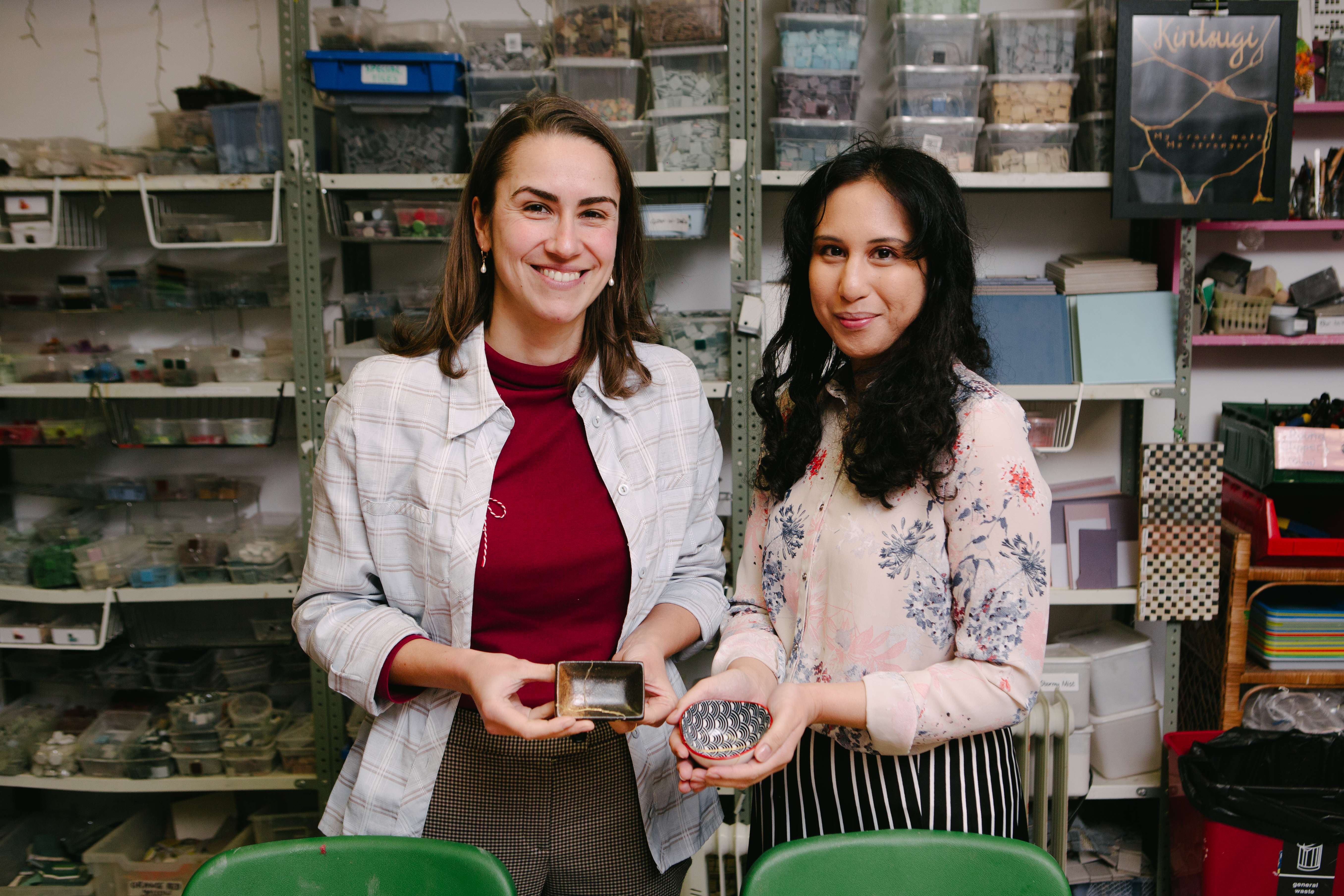 Two women showing off their Kintsugi pieces