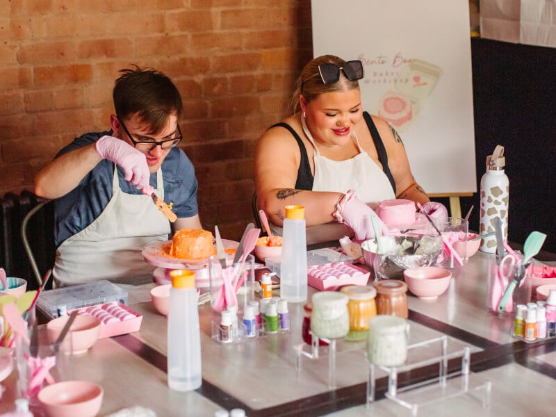 People decorating bento cakes