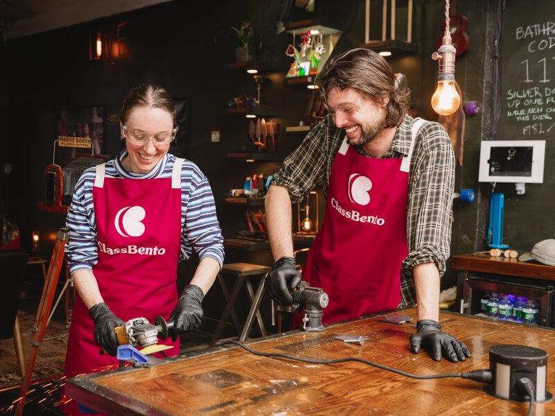 People enjoying a DIY metal planter box class