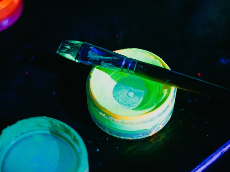 Yellow paint pot and brush capture in fluorescent light