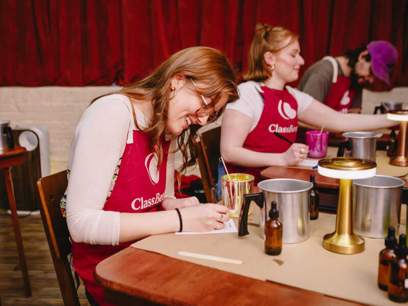 Woman enjoying a candle making class
