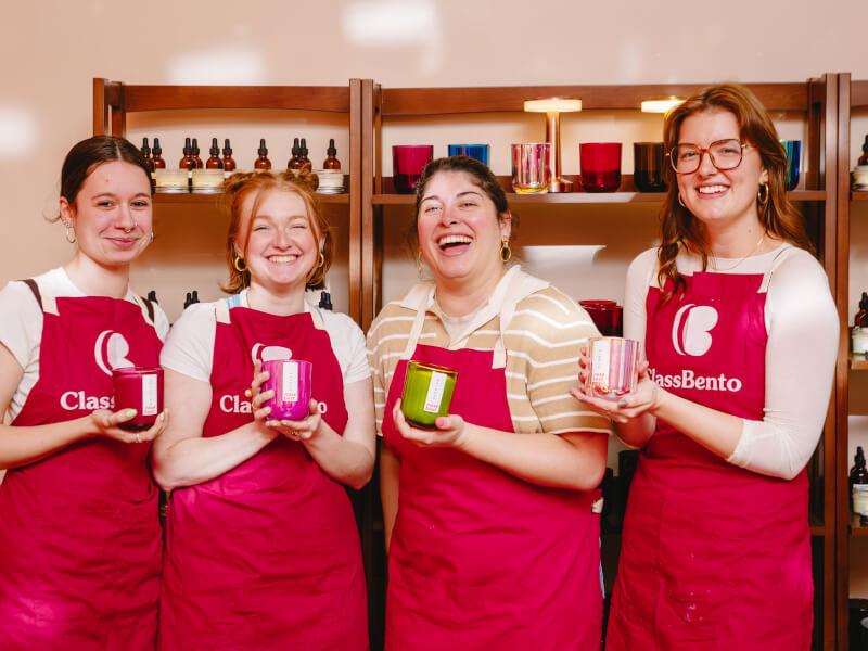 Group of women holding their finished candles