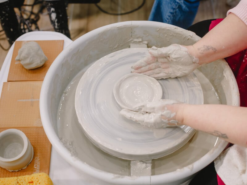 Person wheel throwing