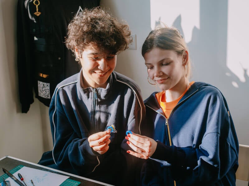 Friends holding DIY rings