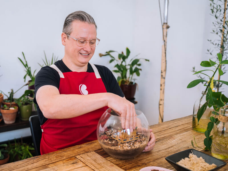 Father making a terrarium
