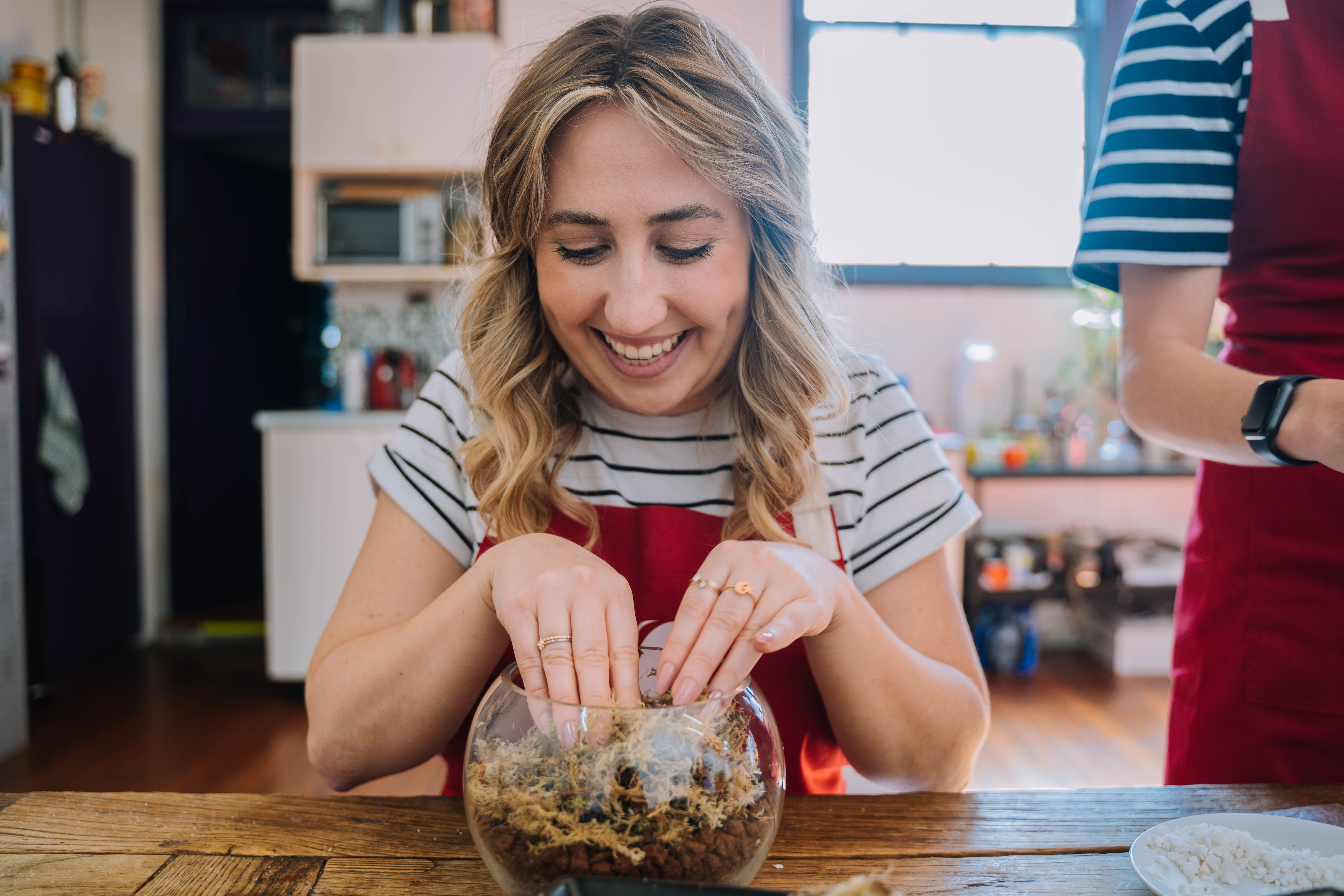 Woman making a terrarium