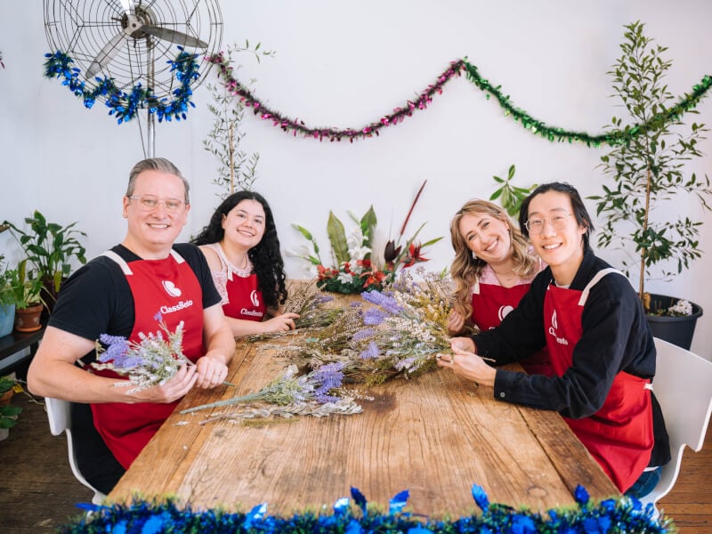 Group of people at a festive floristry class