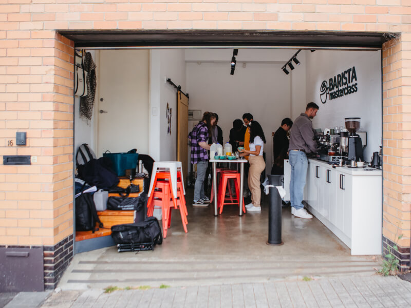 Garage with barista coffee machines set up inside