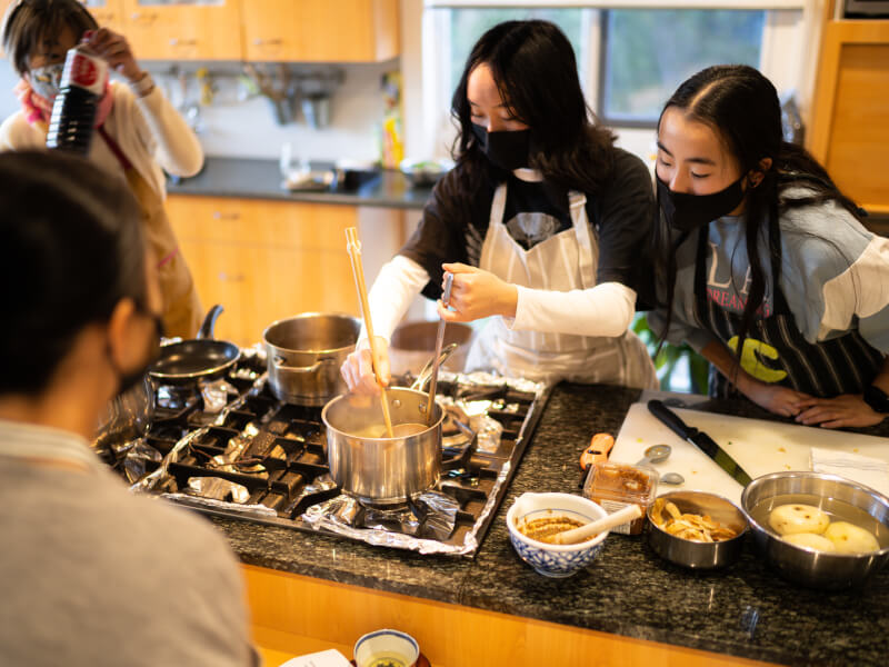 A group of teenagers enjoying a cooking class