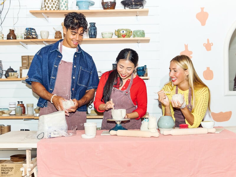 Fun team doing pottery together
