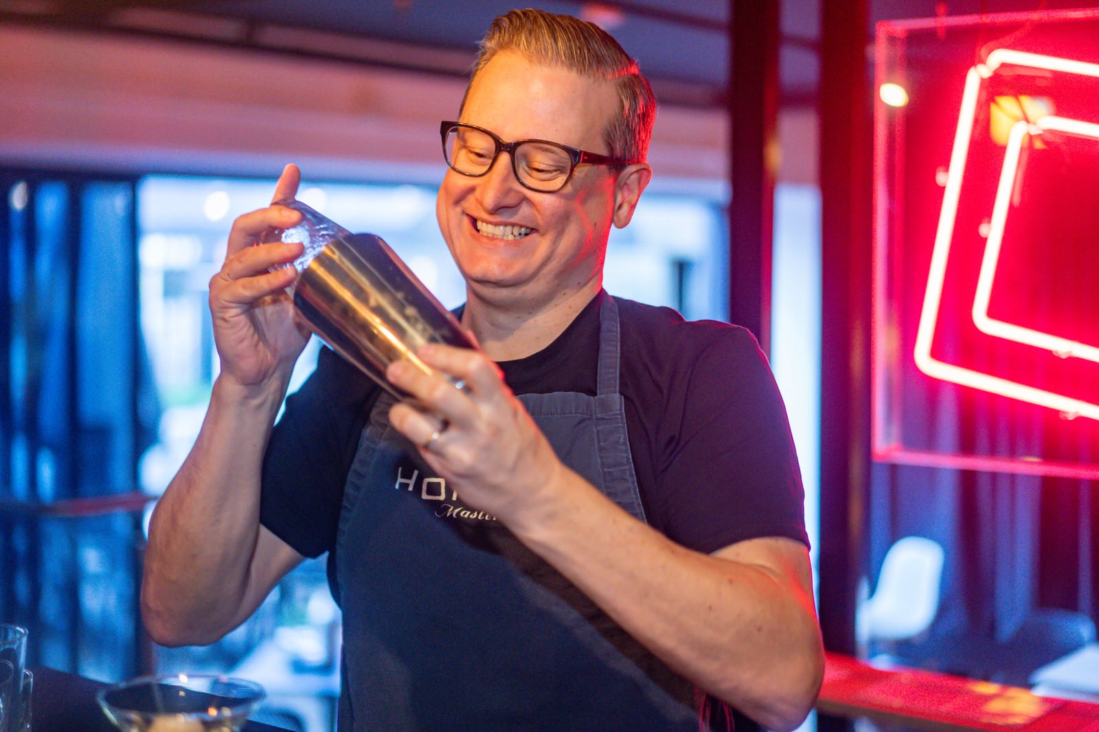 Man shaking a cocktail