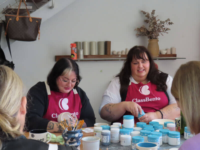 Women painting on ceramics