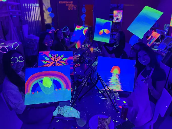 Paint in the dark paint and sip experience